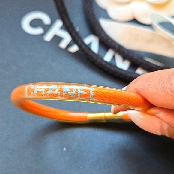 CHANEL Accessories - CHANEL Vibrant Orange Bangle
